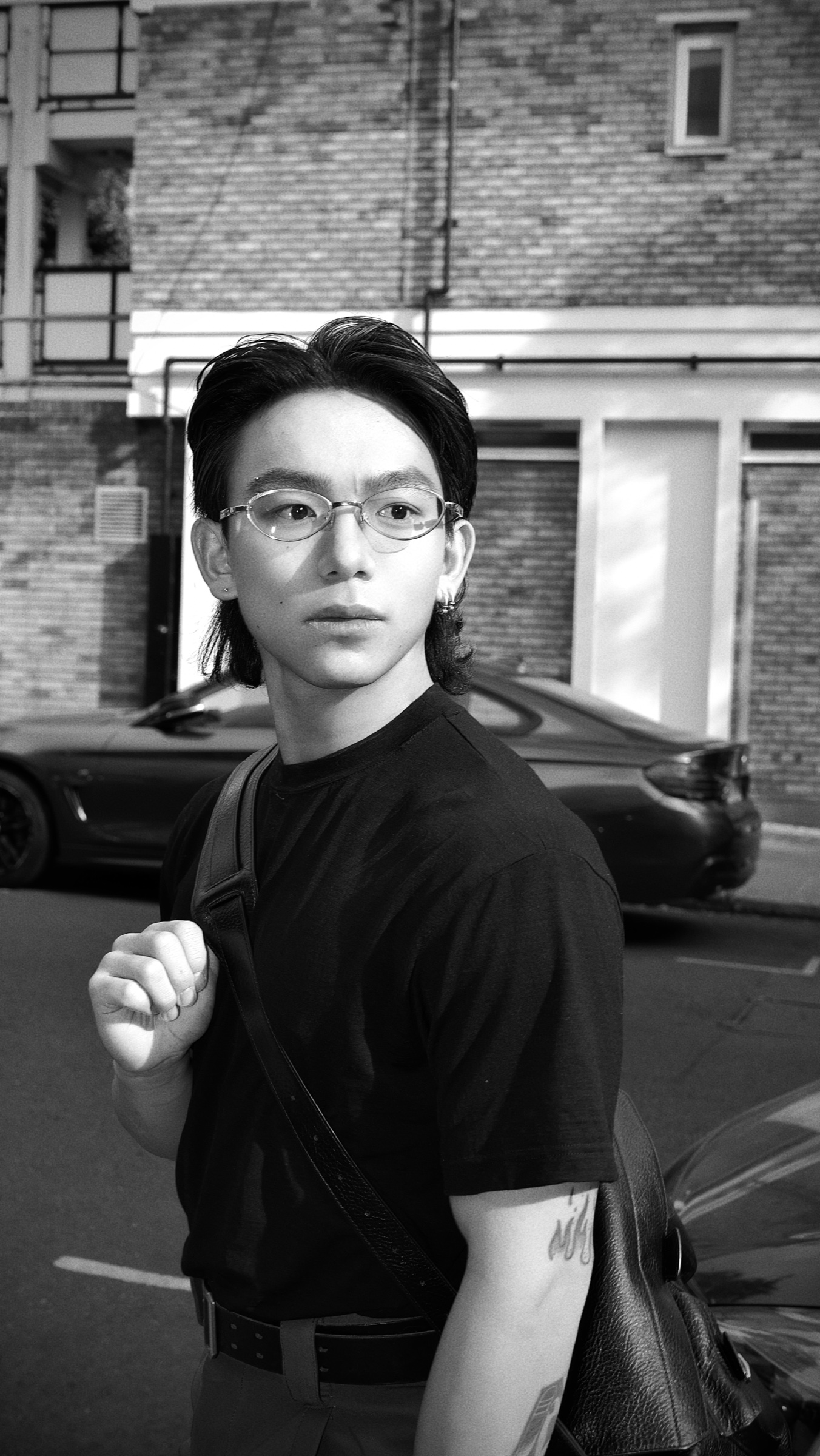 Black-and-white portrait of Jason Chen in London
